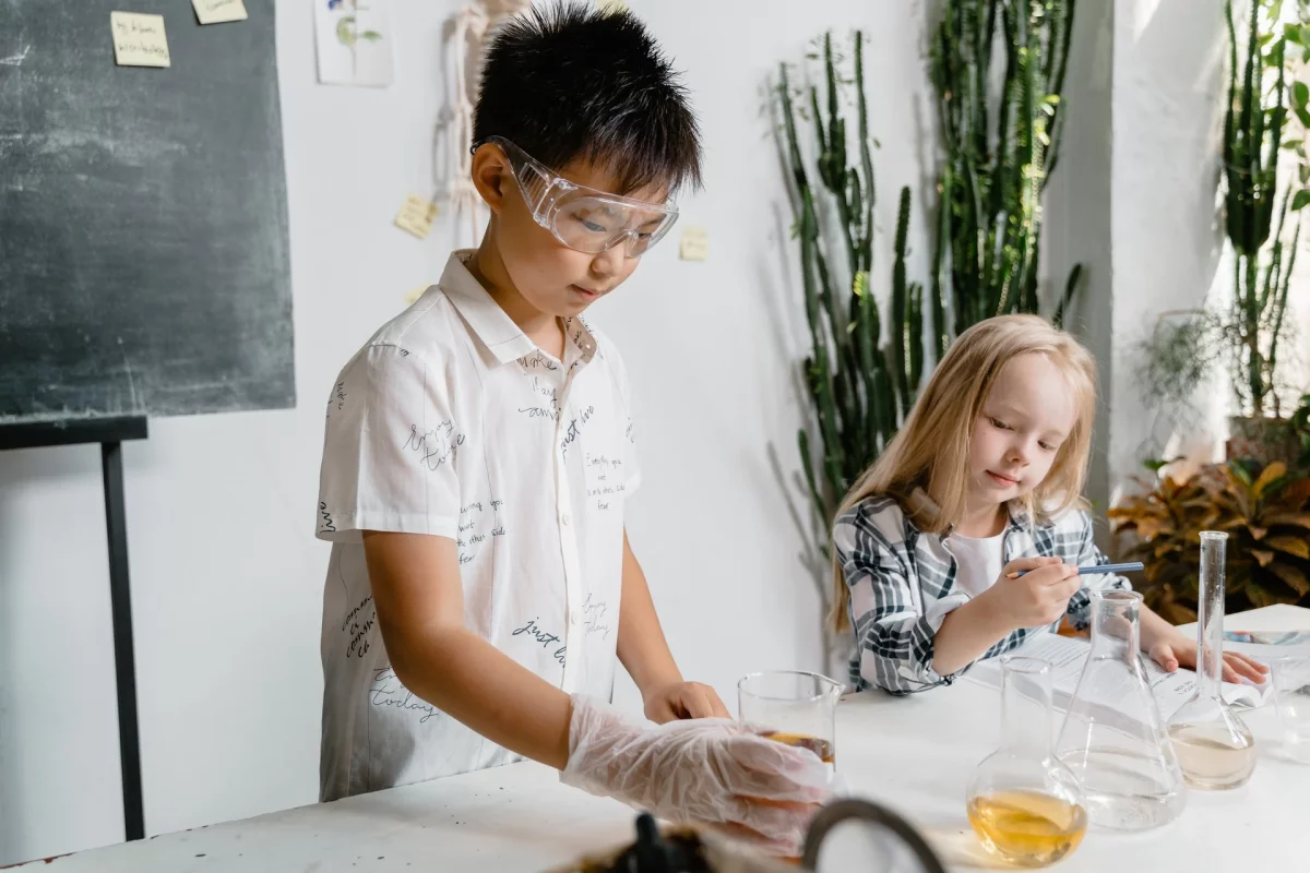 child looking at lab equipment