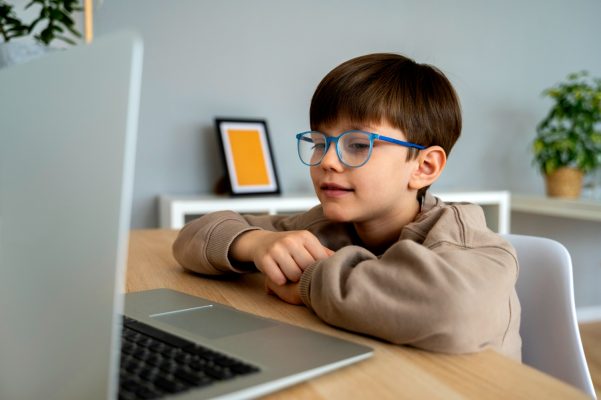 child-studying-on-a-laptop