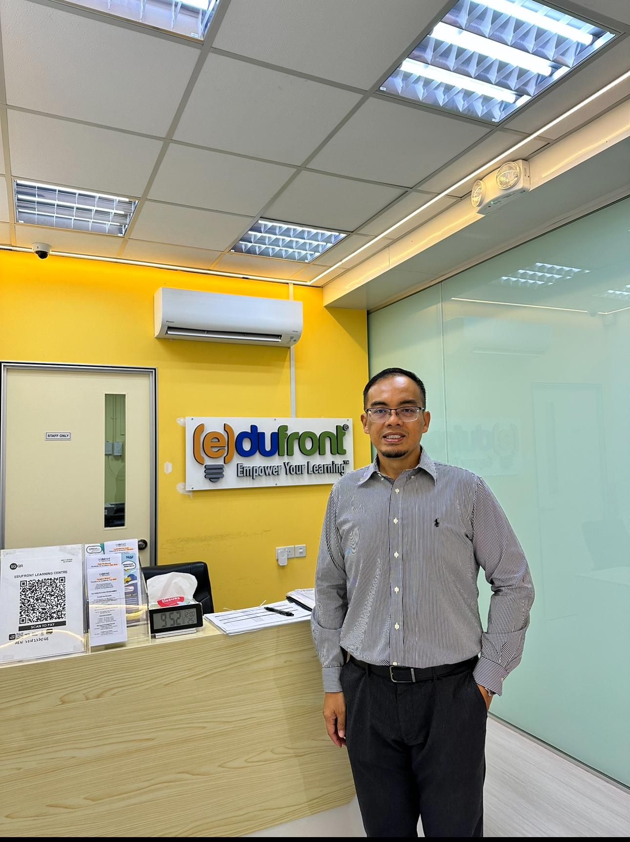 mr yang iskandar in his tuition centre